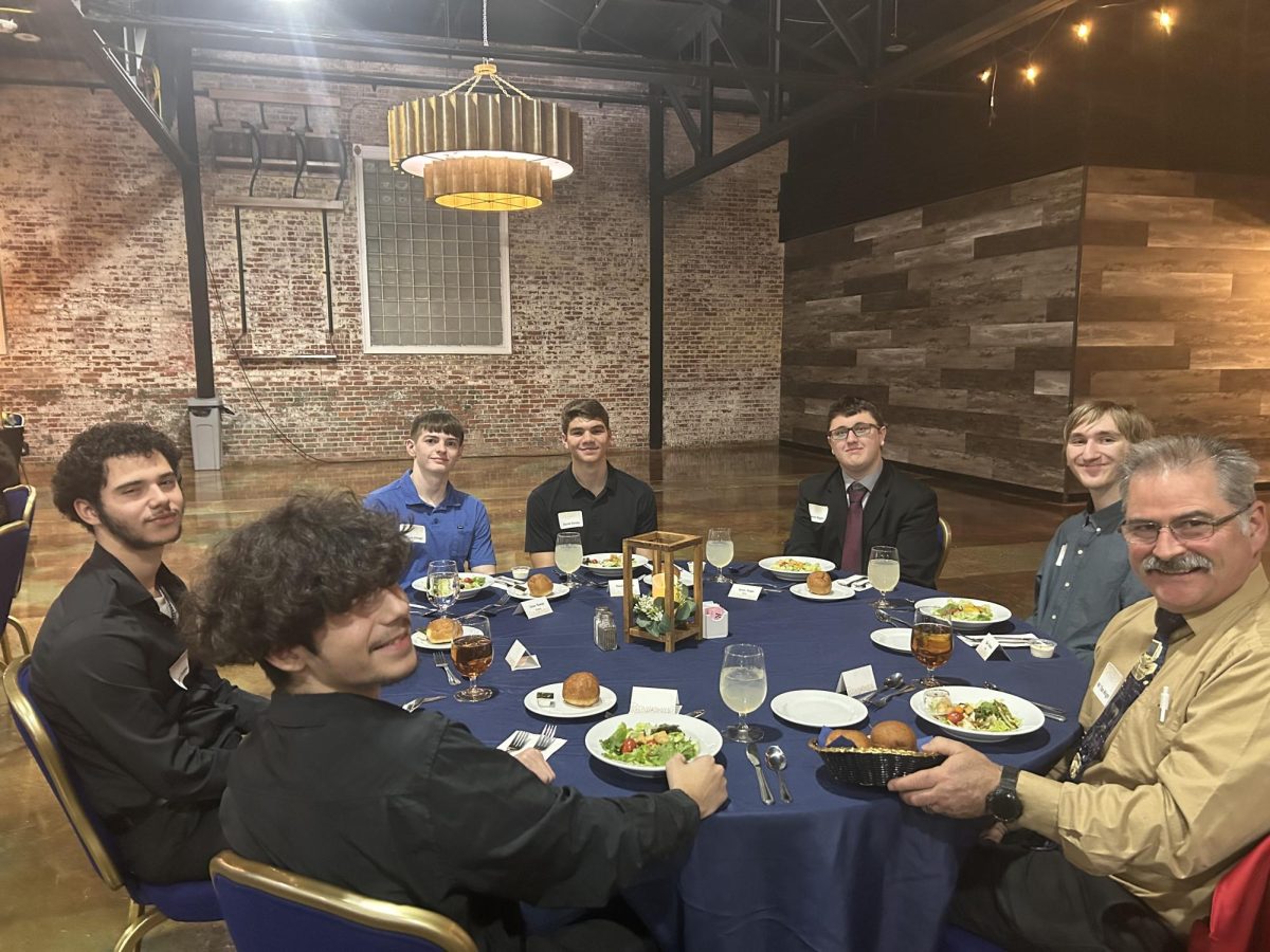 Staff and students understanding etiquette with dinner